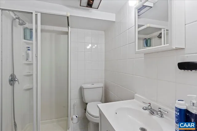 a view of backyard with a garden and deck