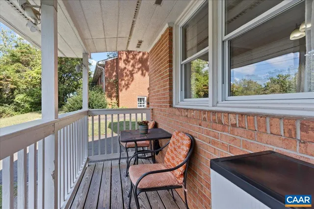 a bathroom with a sink a mirror and vanity
