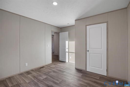 644 Tisdale Road Louisa, VA 23093 - Photo 8 of 19 Room featuring wood-finish flooring, recessed ligh