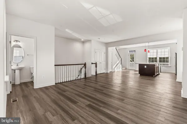 a view of a livingroom with wooden floor