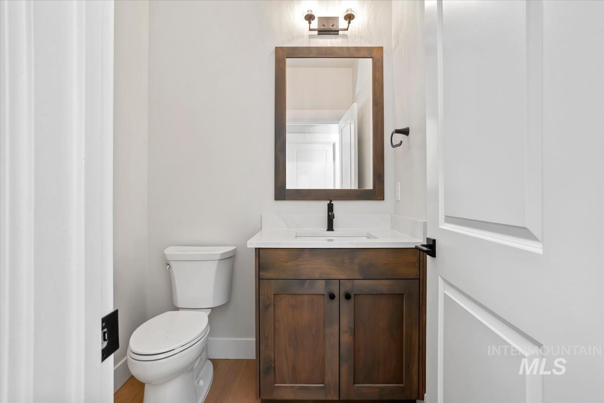 232 South Fusion Avenue Kuna, ID 83634 - Photo 34 of 50 Bathroom featuring vanity and light wood-style flooring