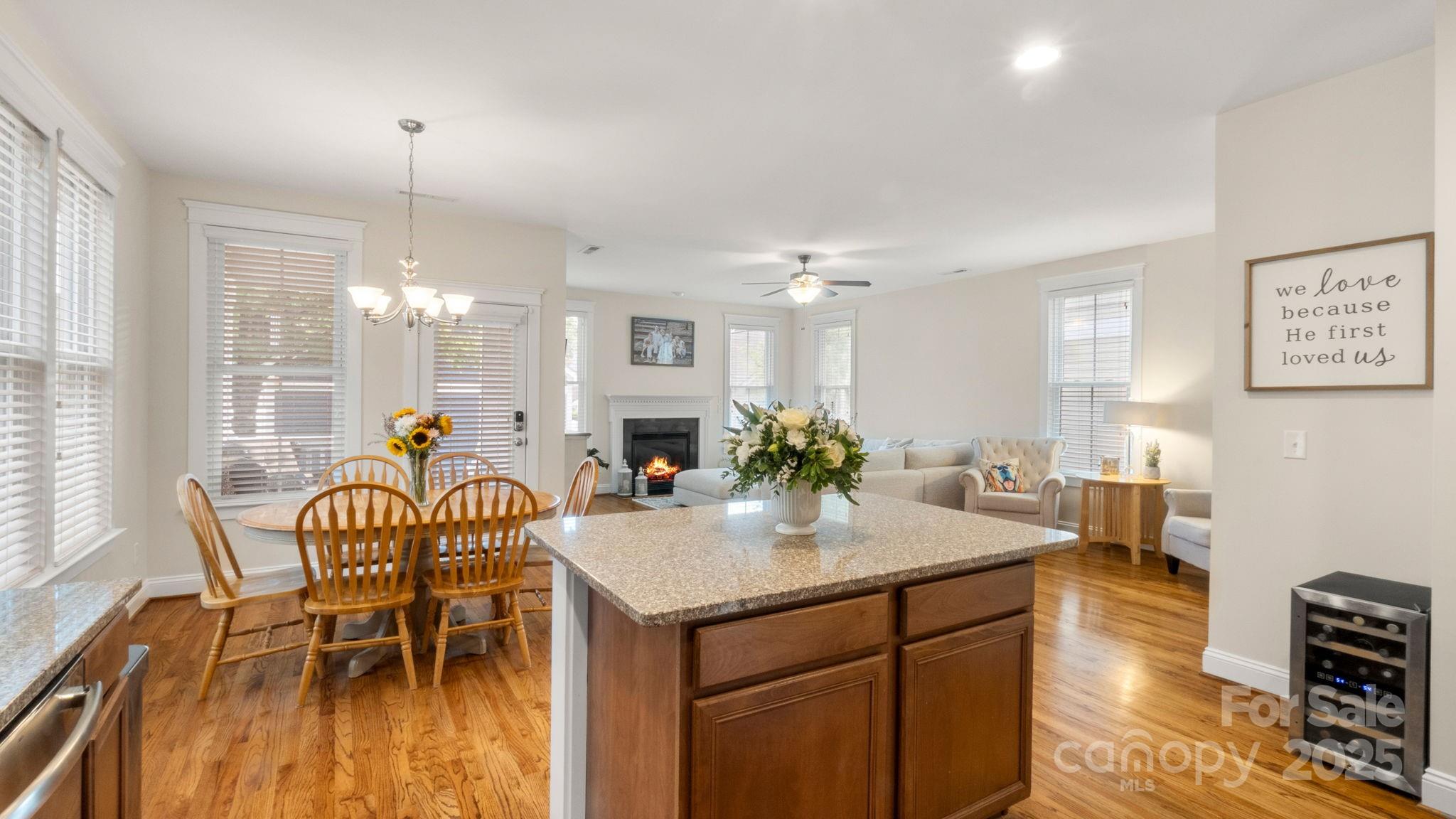3499 Richard's Crossing Fort Mill, SC 29708 - Photo 13 of 33 a kitchen with a table chairs and white cabinets