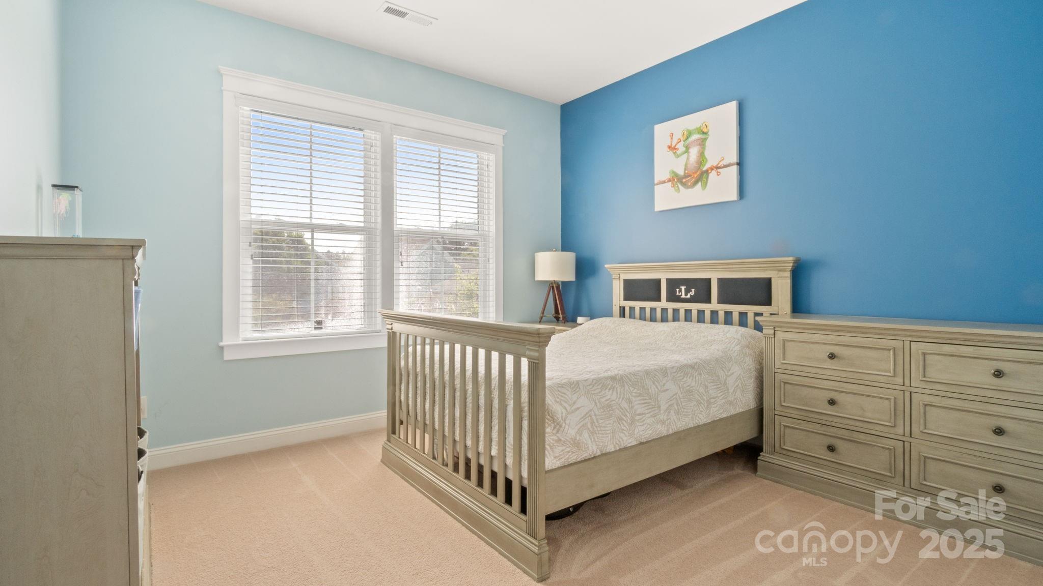 3499 Richard's Crossing Fort Mill, SC 29708 - Photo 18 of 33 a bed room with a bed and a window