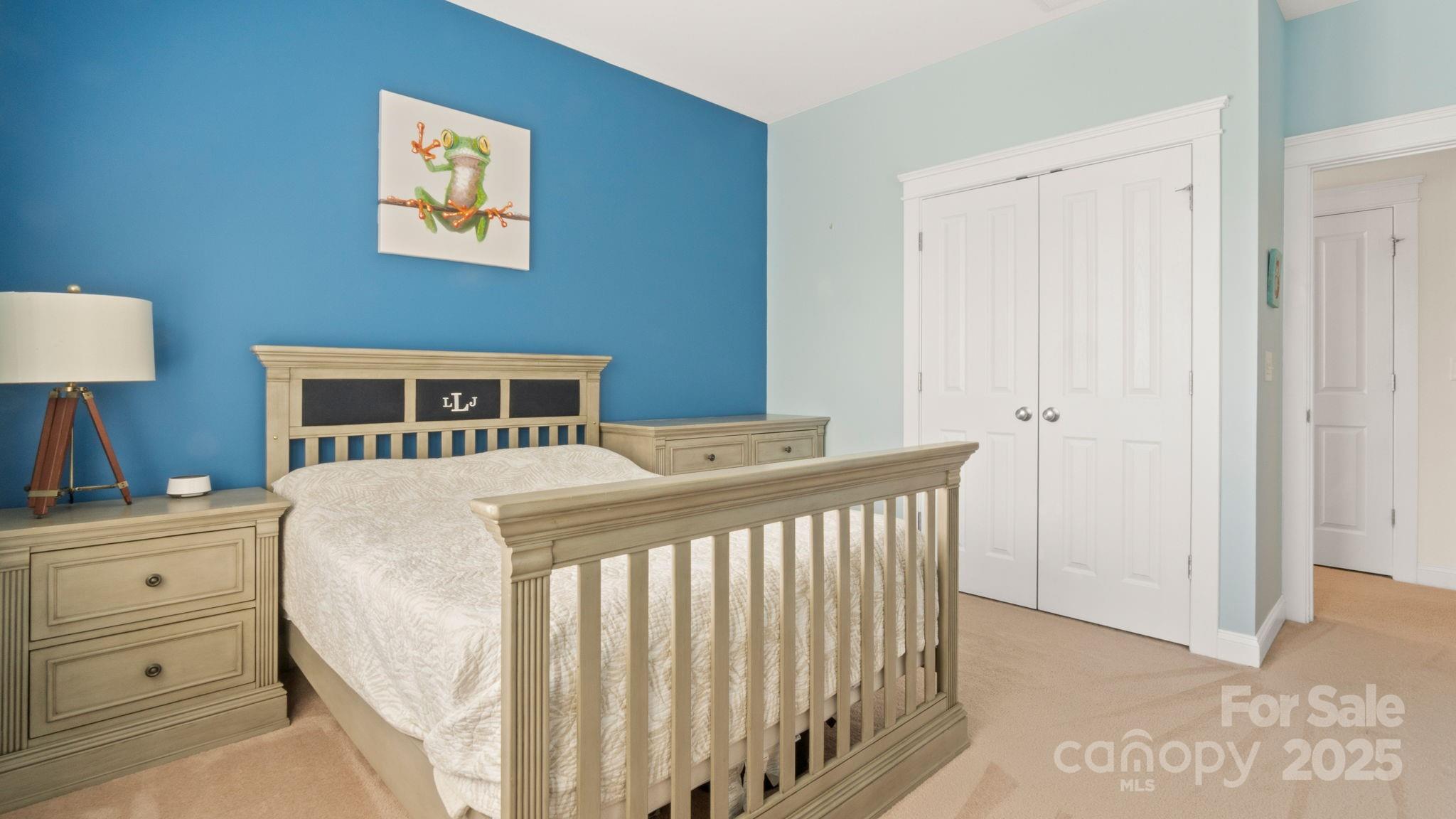 3499 Richard's Crossing Fort Mill, SC 29708 - Photo 19 of 33 a bedroom with a bed and a lamp on dresser