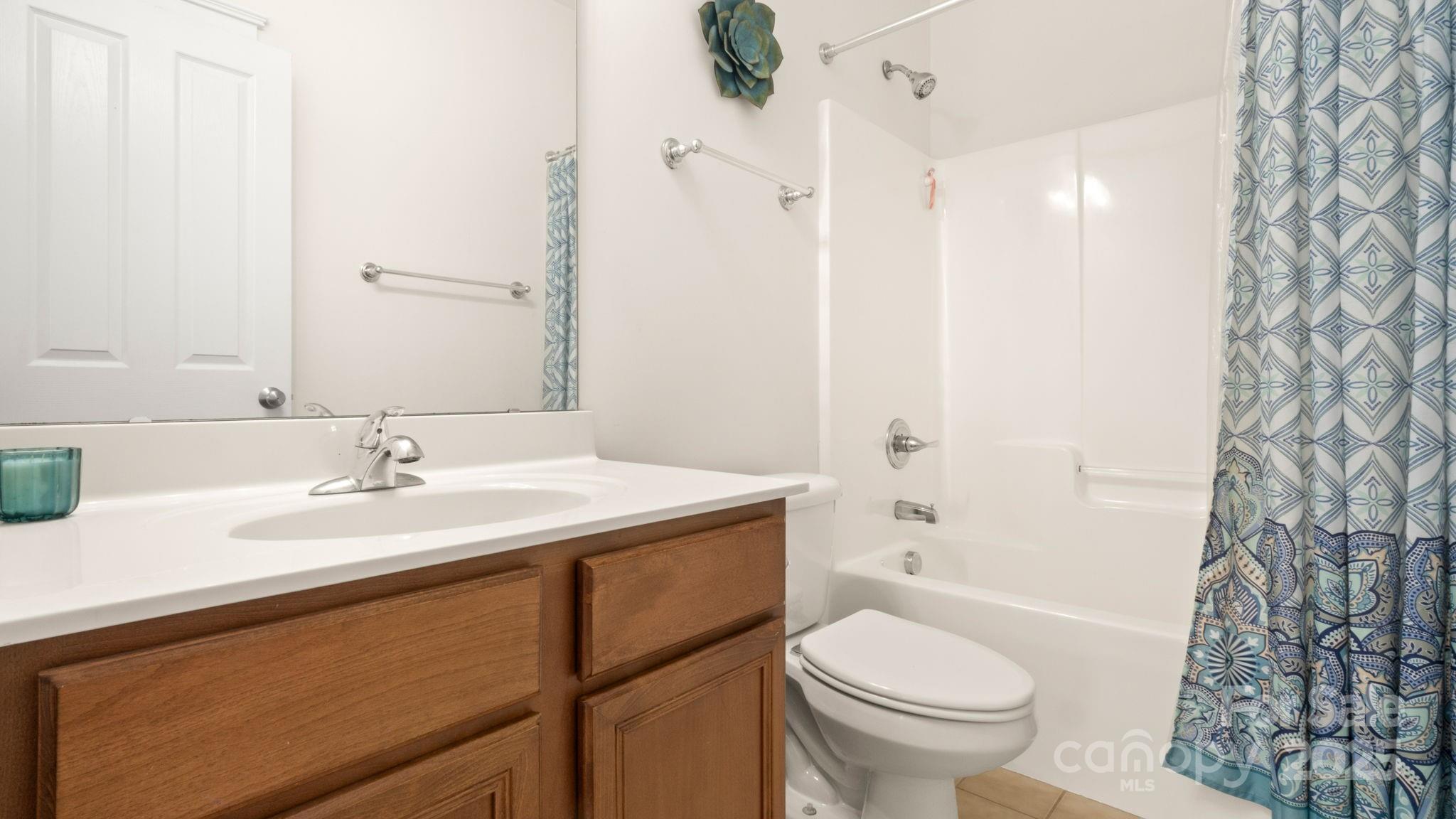 3499 Richard's Crossing Fort Mill, SC 29708 - Photo 20 of 33 a bathroom with a sink toilet vanity and shower