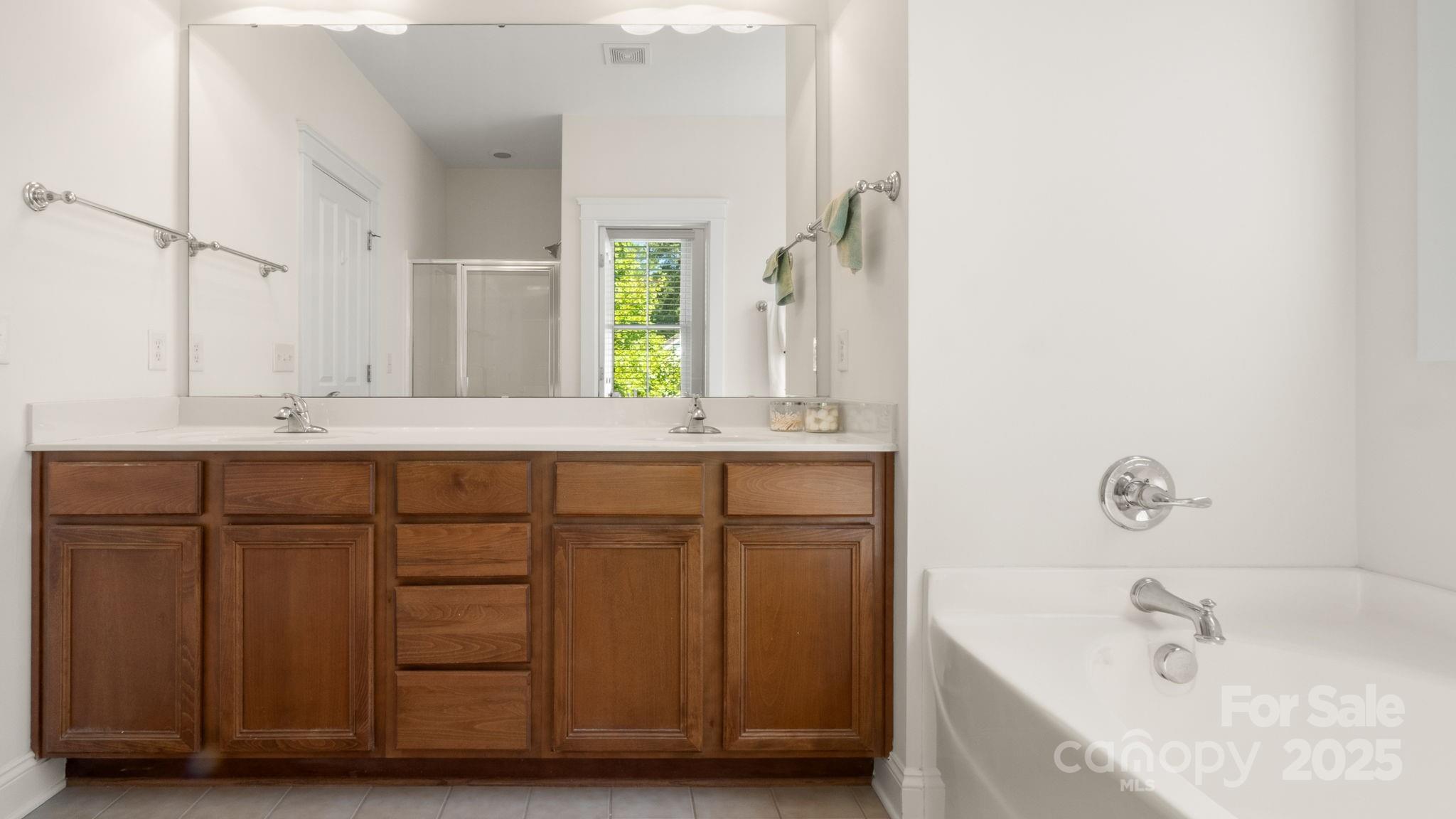 3499 Richard's Crossing Fort Mill, SC 29708 - Photo 25 of 33 a bathroom with a sink and a bathtub