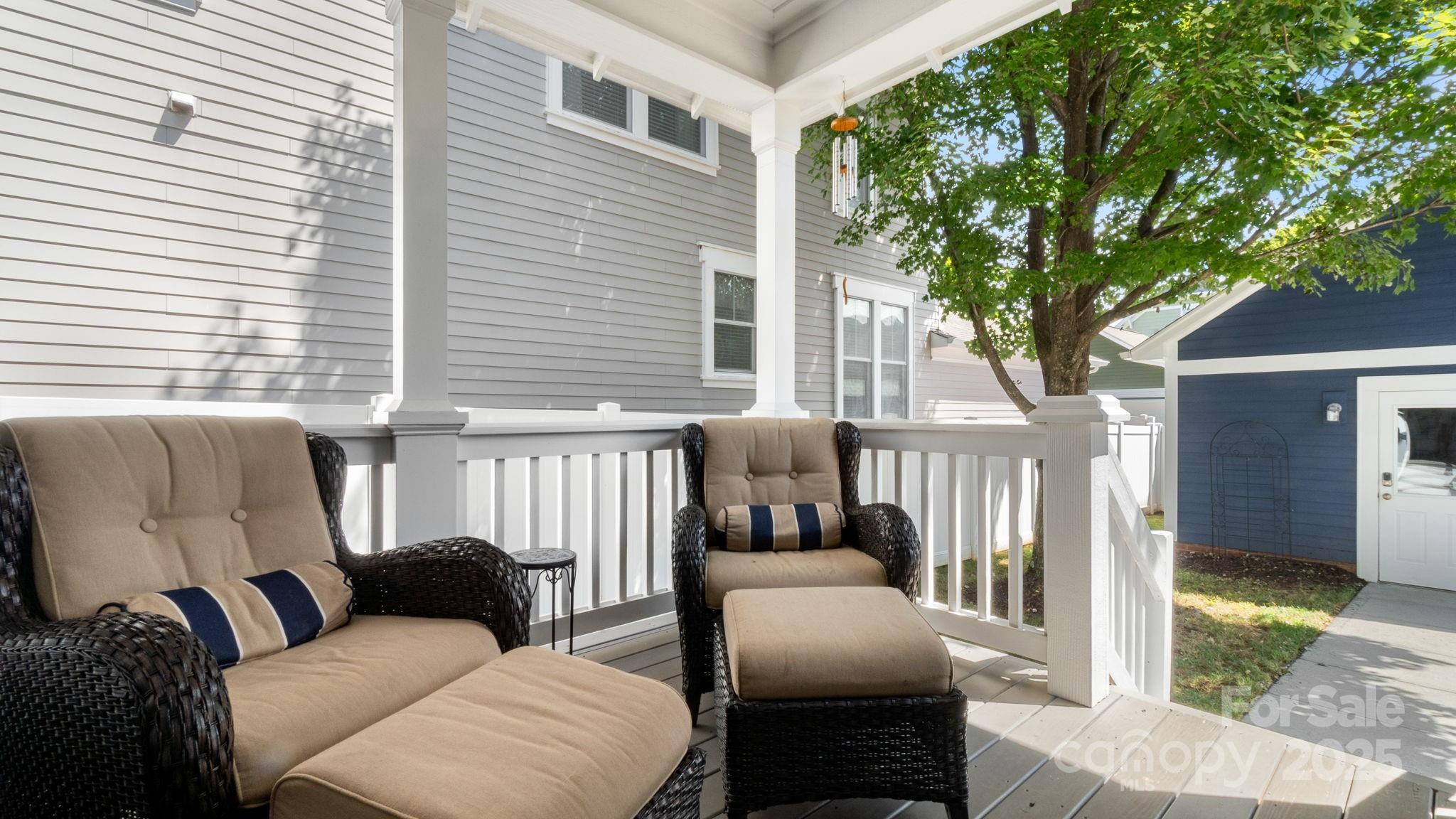 3499 Richard's Crossing Fort Mill, SC 29708 - Photo 26 of 33 a view of a patio with couches chairs and wooden fence