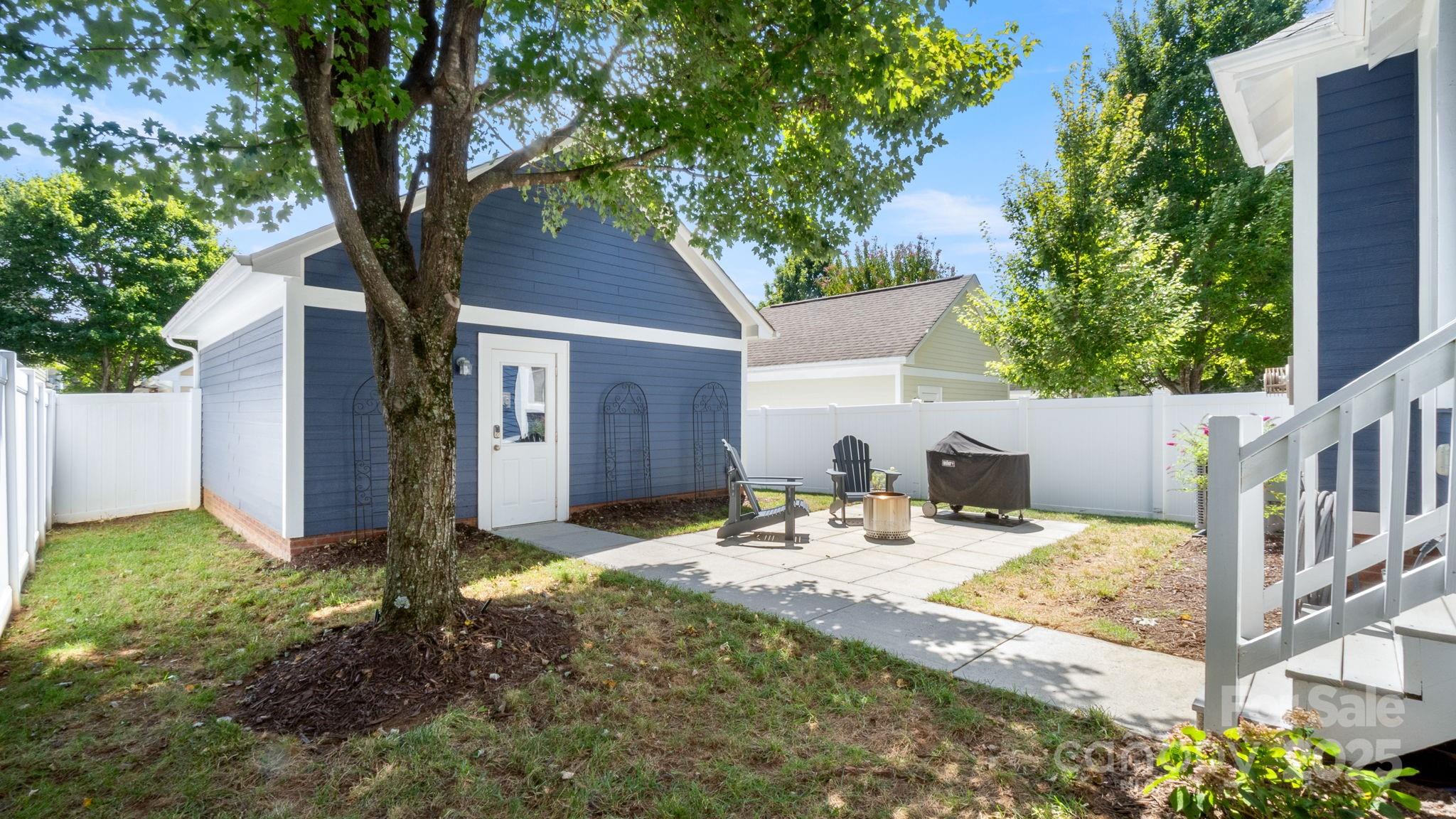 3499 Richard's Crossing Fort Mill, SC 29708 - Photo 27 of 33 a view of backyard of house with seating space