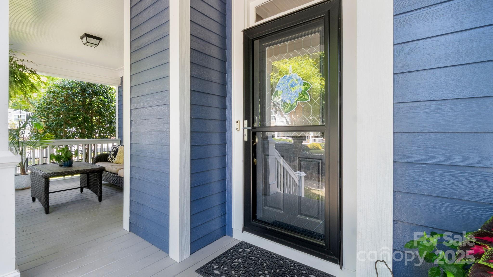 3499 Richard's Crossing Fort Mill, SC 29708 - Photo 3 of 33 a view of a porch with a door and chair