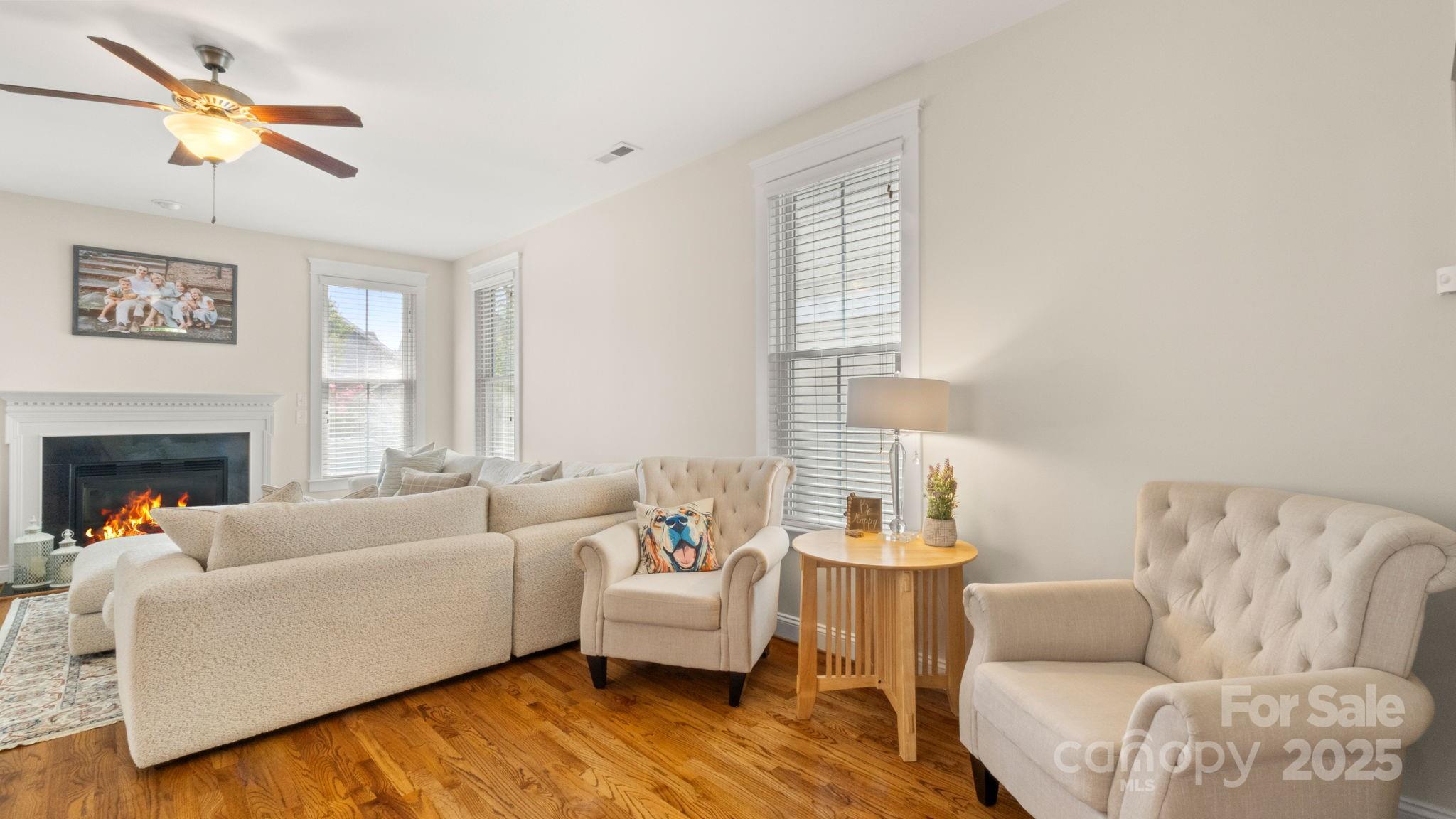 3499 Richard's Crossing Fort Mill, SC 29708 - Photo 9 of 33 a living room with furniture and a fireplace