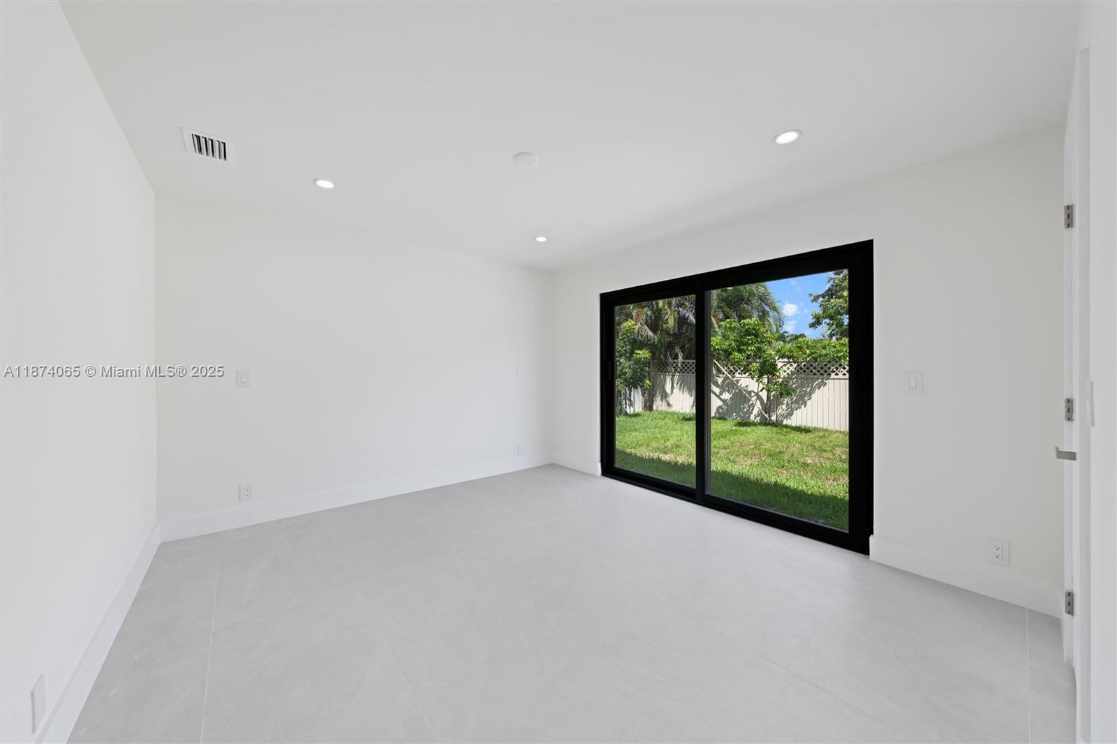 3041 Northeast 45th Street Lighthouse Point, FL 33064 - Photo 14 of 20 a view of a big room with large windows