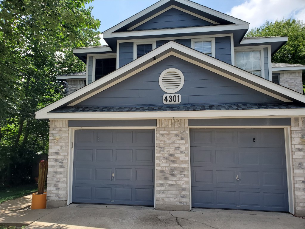 a front view of a house with a fence