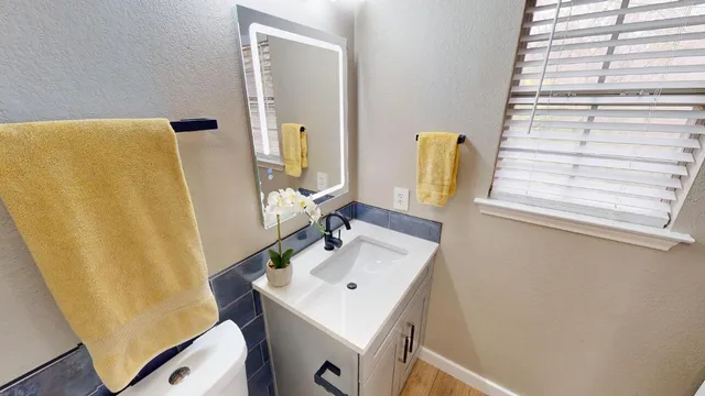 a bathroom with a shower and a toilet