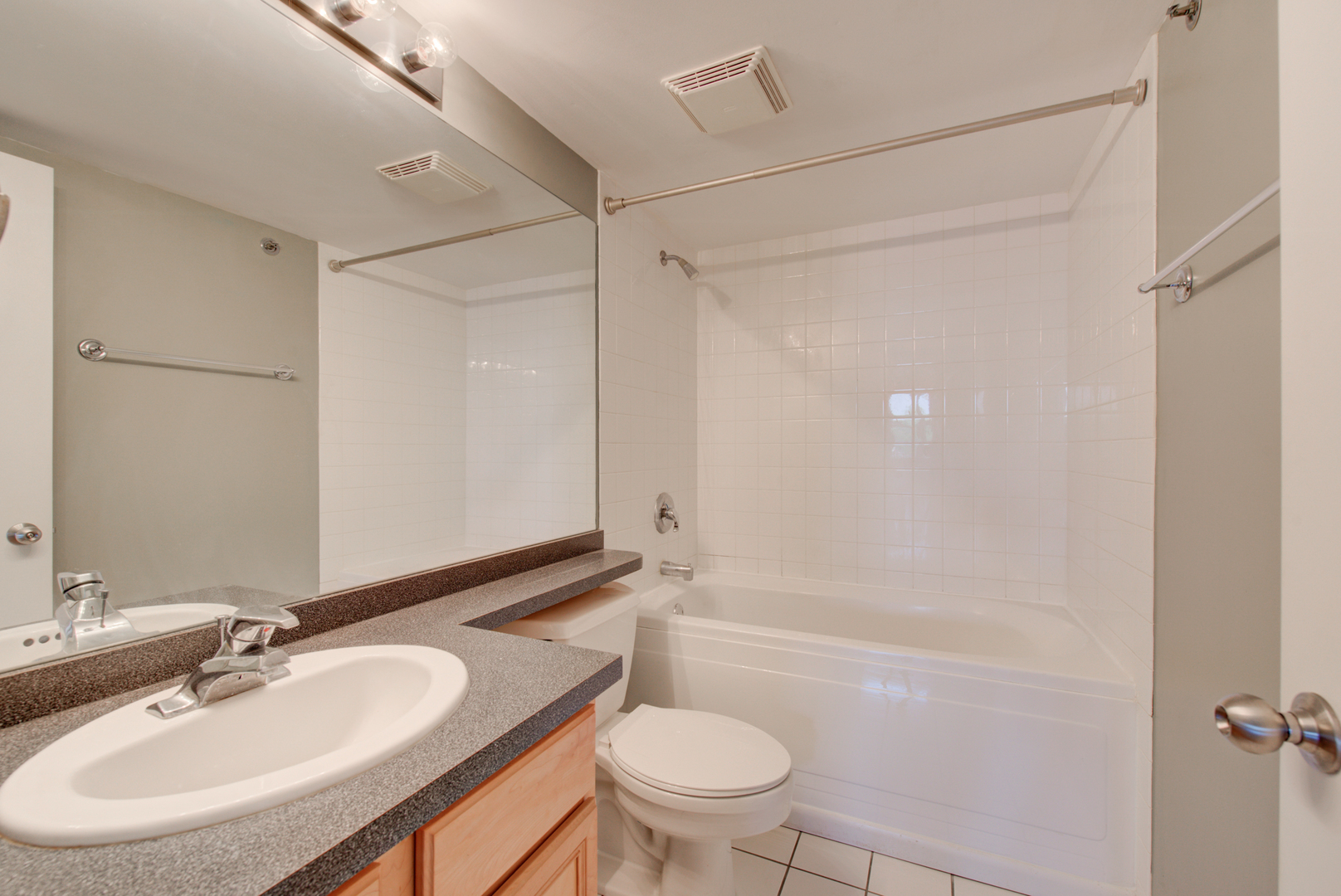 500 South Clinton Street, Unit 230 Chicago, IL 60607 - Photo 17 of 31 a bathroom with a sink toilet and shower