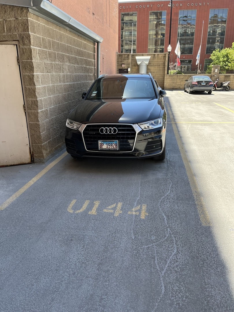 500 South Clinton Street, Unit 230 Chicago, IL 60607 - Photo 28 of 31 a car parked on the side of street