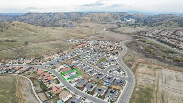a view of a house with a ocean view