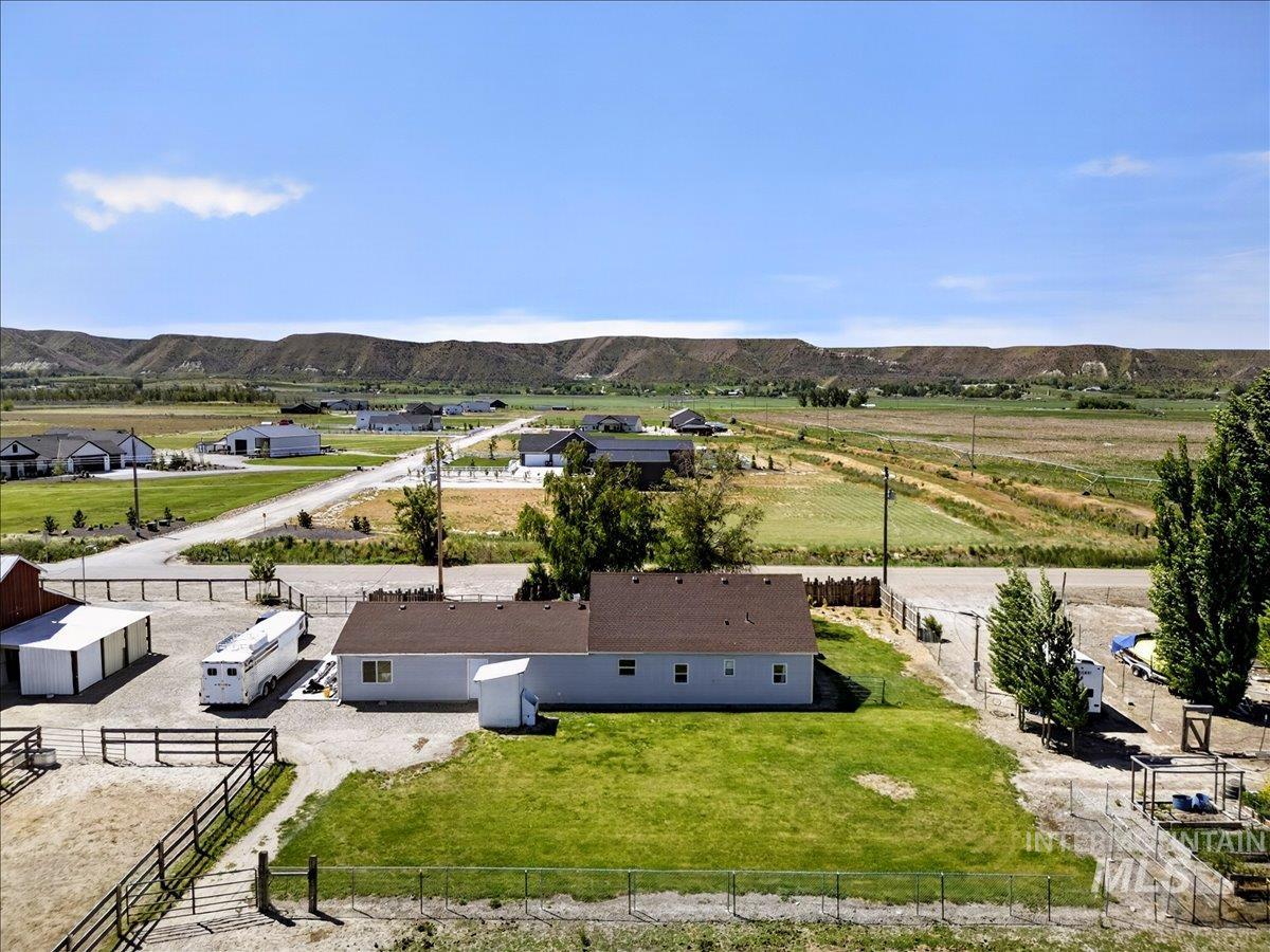 2588 West Sales Yard Road Emmett, ID 83617 - Photo 46 of 49 Light blue exterior residence with a brown shingle roof