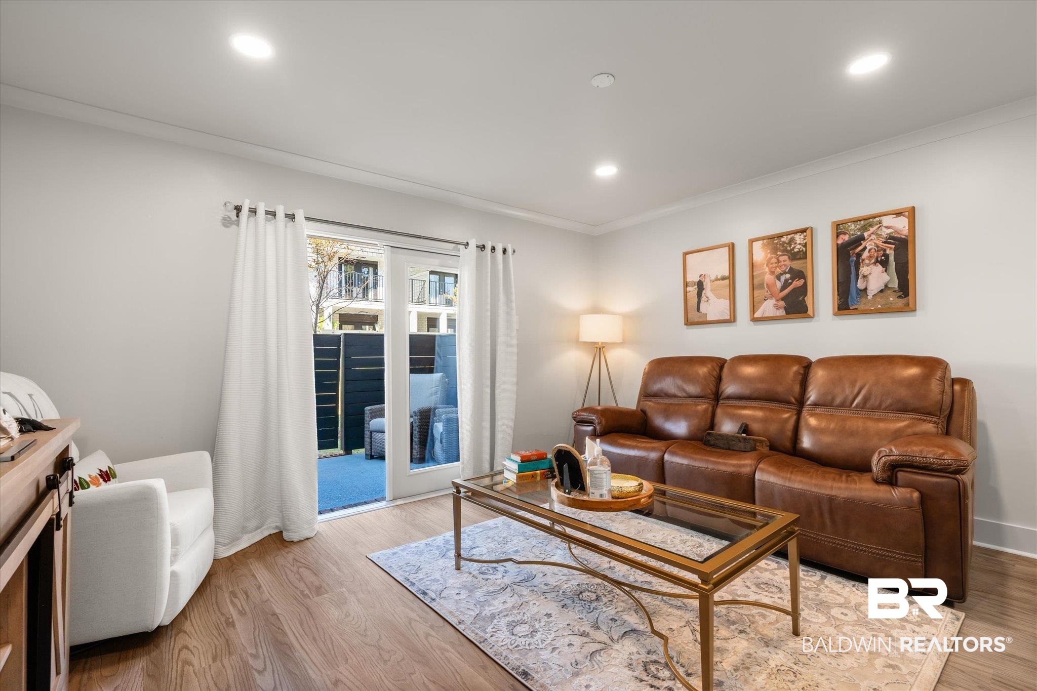 3655 Old Shell Road, Unit 313 Mobile, AL 36608 - Photo 6 of 20 Living room with crown molding and light wood-type flooring