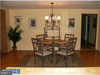 145 Big Oak Road Bridgeton, NJ 08302 - Photo 3 of 12 a view of a dining room with furniture and wooden floor