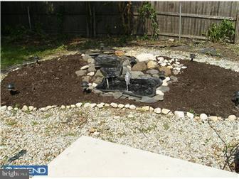 145 Big Oak Road Bridgeton, NJ 08302 - Photo 6 of 12 a view of a yard with wooden fence