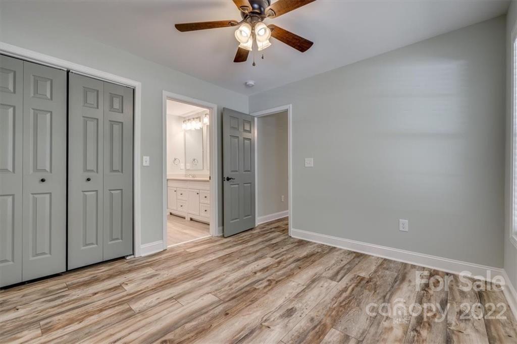 6973 Narrow Lane Road Hickory Grove, SC 29717 - Photo 18 of 35 wooden floor in an empty room with a window
