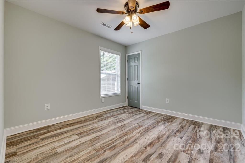 6973 Narrow Lane Road Hickory Grove, SC 29717 - Photo 24 of 35 a view of room with window and ceiling fan