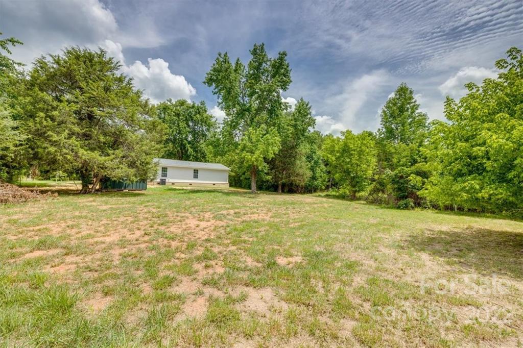 6973 Narrow Lane Road Hickory Grove, SC 29717 - Photo 29 of 35 a backyard of a house