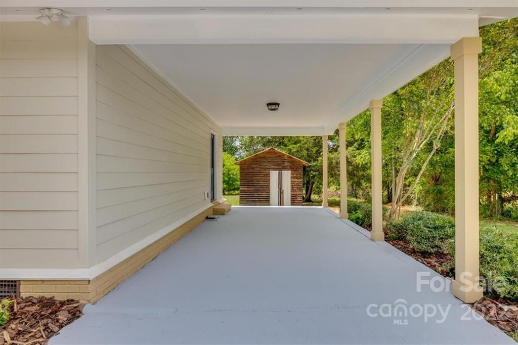 6973 Narrow Lane Road Hickory Grove, SC 29717 - Photo 32 of 35 a view of an empty room with a large window