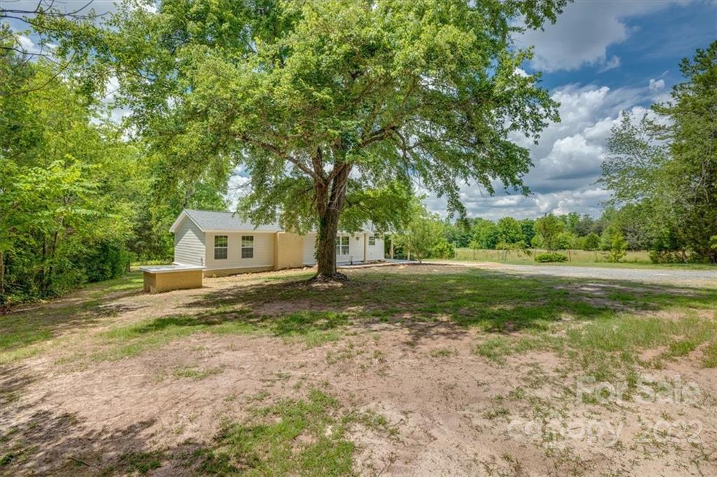 6973 Narrow Lane Road Hickory Grove, SC 29717 - Photo 33 of 35 a view of a house with a yard