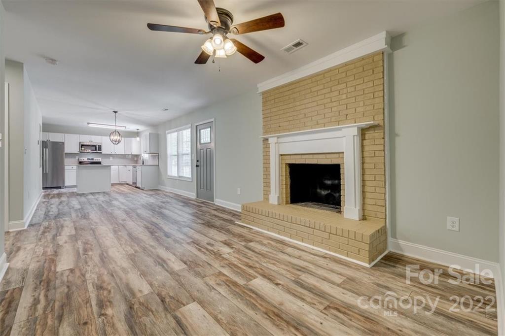 6973 Narrow Lane Road Hickory Grove, SC 29717 - Photo 7 of 35 a view of an empty room and a fireplace