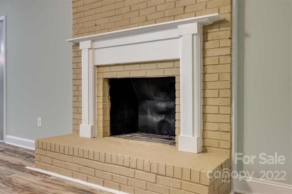 6973 Narrow Lane Road Hickory Grove, SC 29717 - Photo 8 of 35 a bedroom with a bed and a fireplace