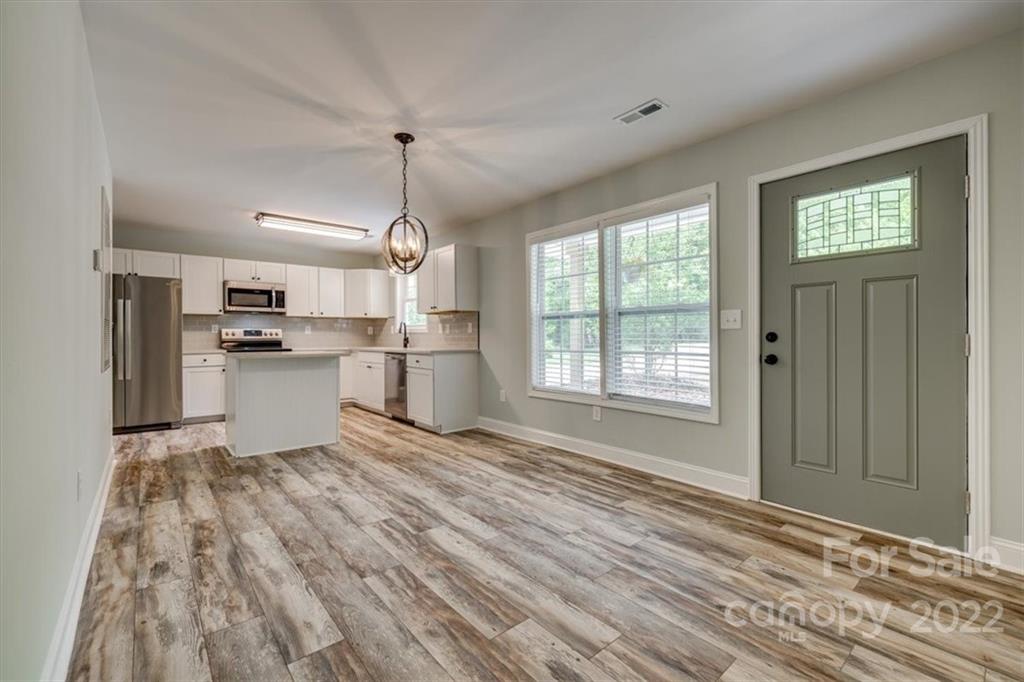 6973 Narrow Lane Road Hickory Grove, SC 29717 - Photo 10 of 35 a view of a kitchen with microwave and refrigerator