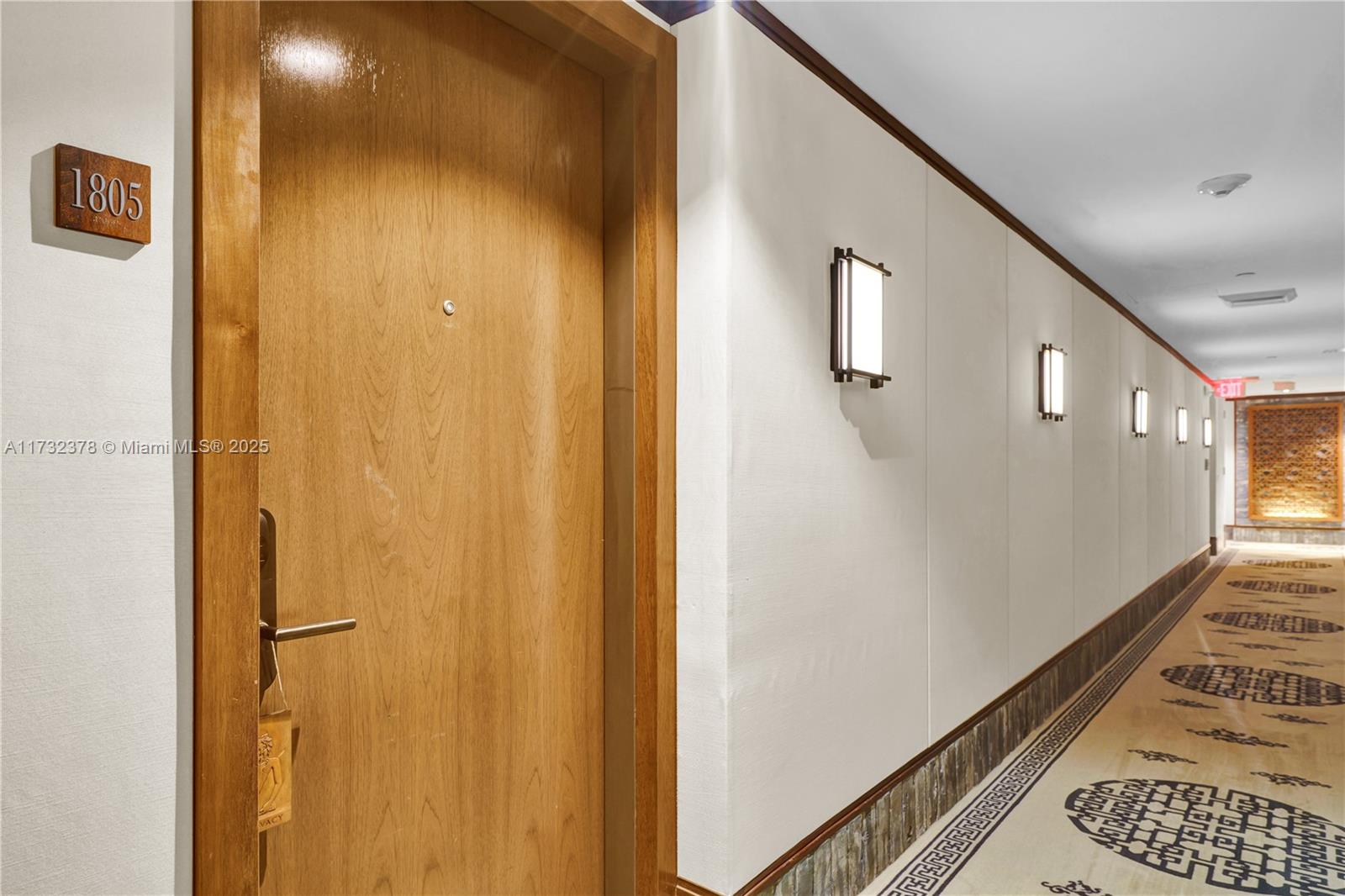 101 20th Street, Unit 1805 Miami Beach, FL 33139 - Photo 2 of 50 a view of a hallway with a large window and painted walls
