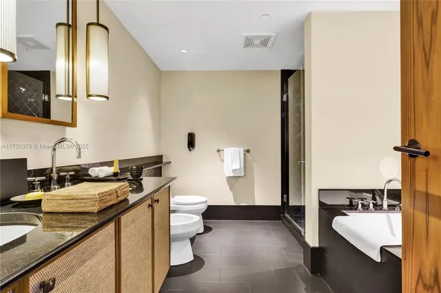 a bathroom with a bathtub and a sink