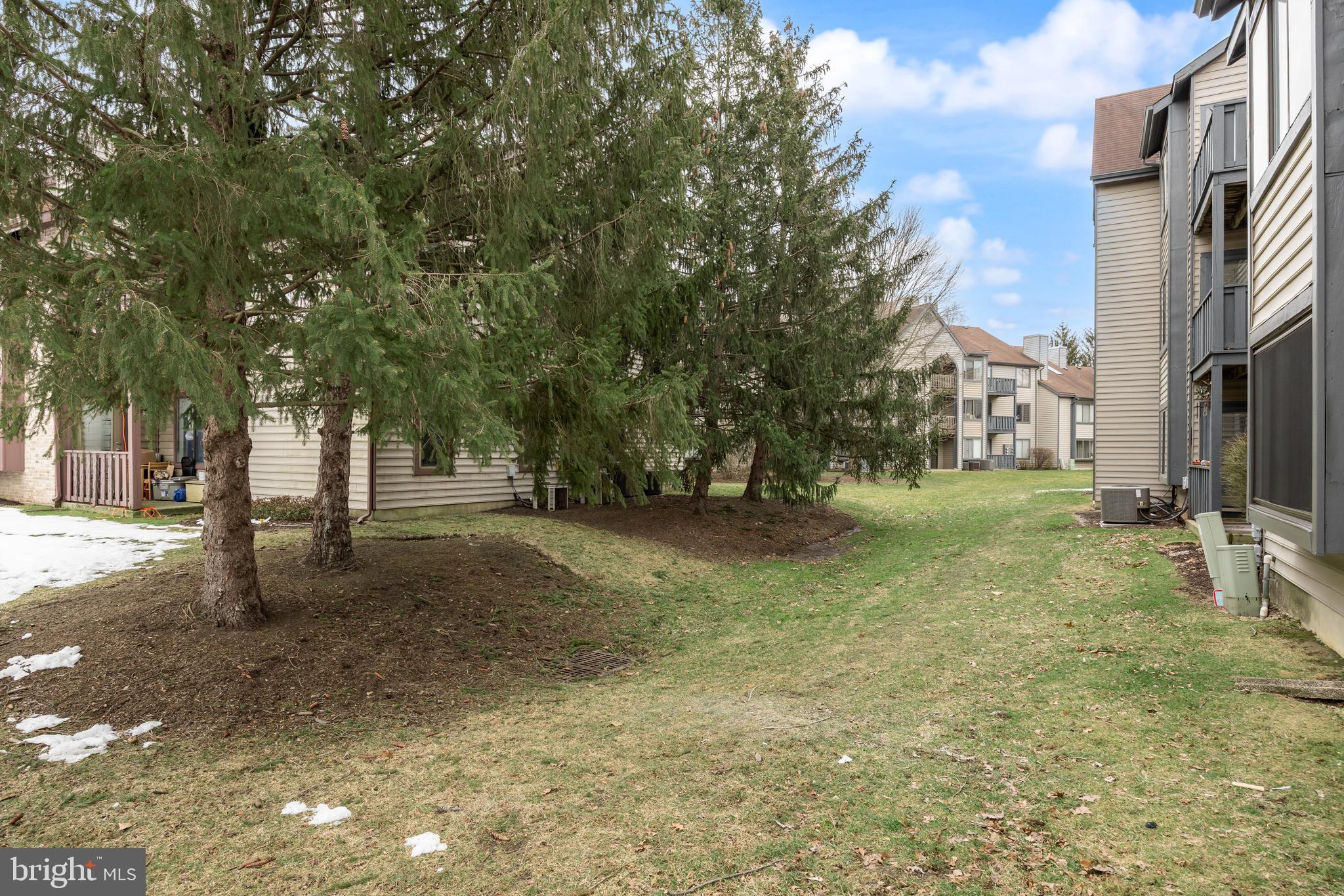 4904B Dunbarton Road Mount Laurel, NJ 08054 - Photo 23 of 27 a view of a yard with a tree