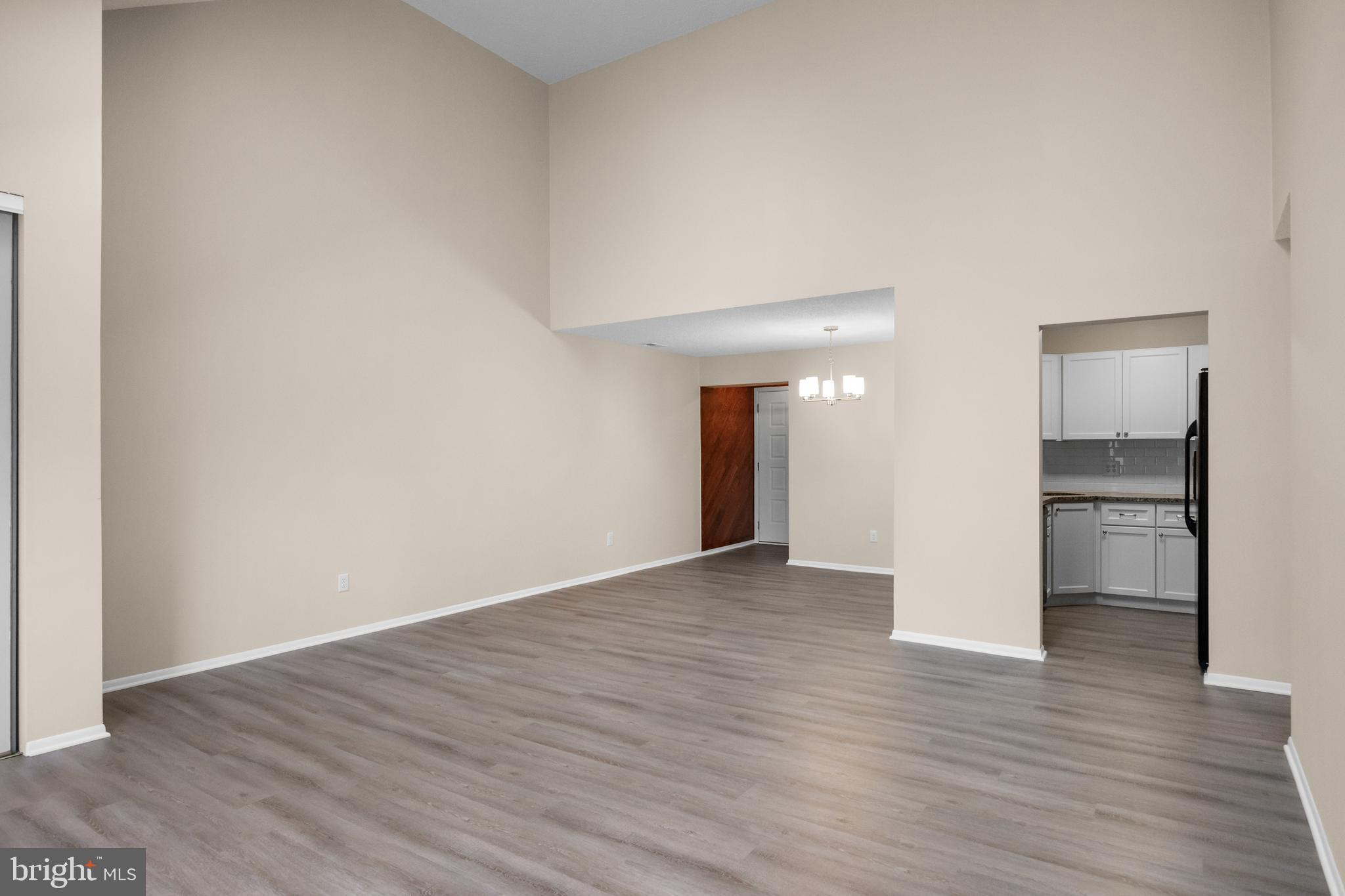 4904B Dunbarton Road Mount Laurel, NJ 08054 - Photo 6 of 27 a view of an empty room and wooden floor