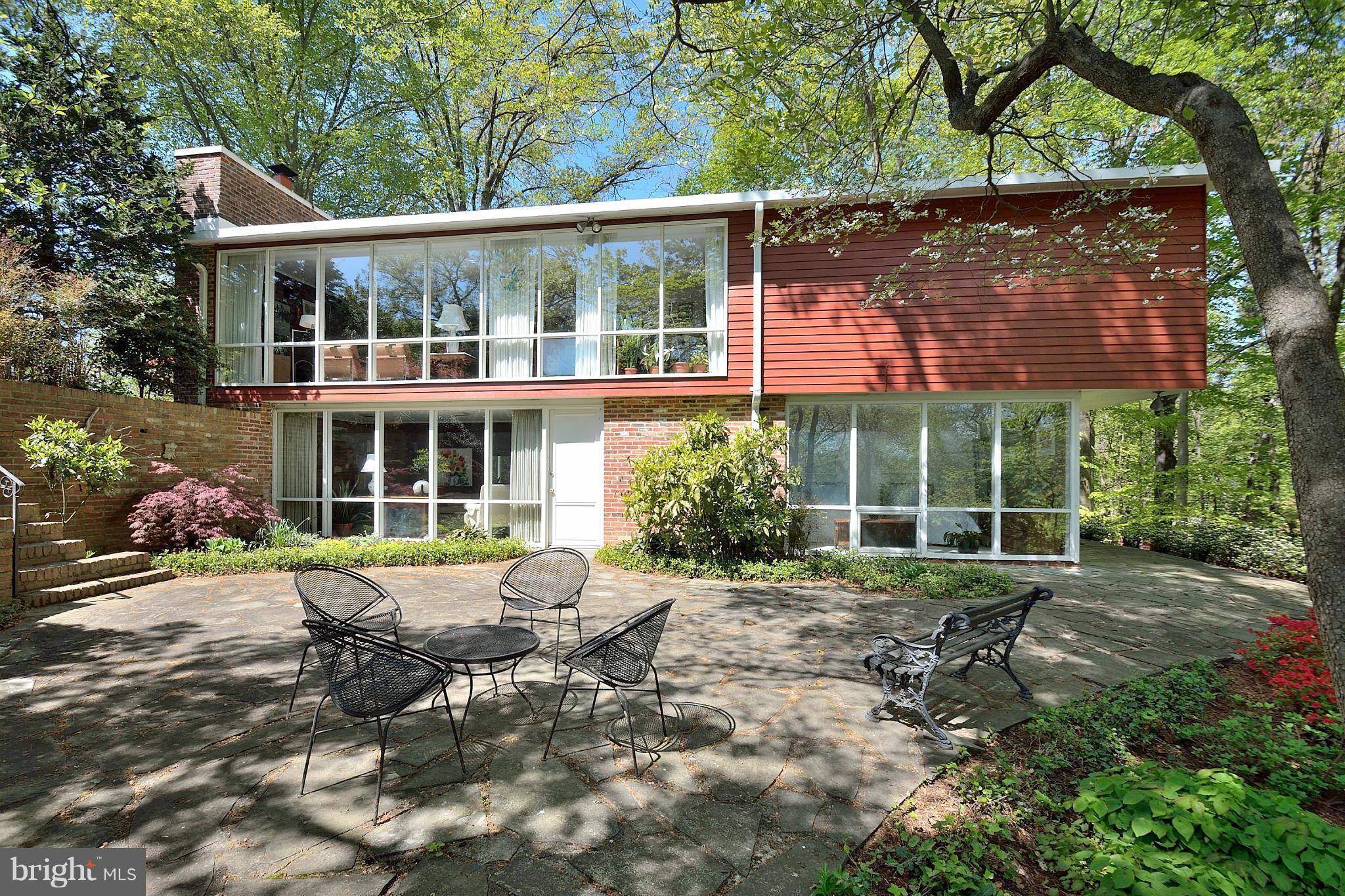 1925 Marthas Road Alexandria, VA 22307 - Photo 1 of 29 a view of a house with backyard and sitting area