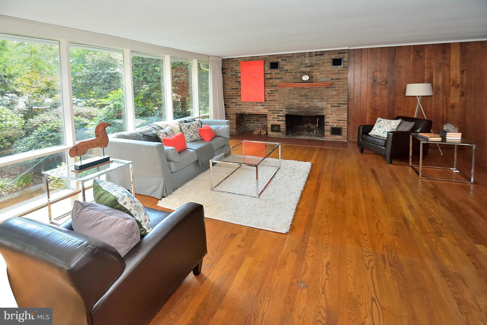 1925 Marthas Road Alexandria, VA 22307 - Photo 2 of 29 a living room with furniture fireplace and window