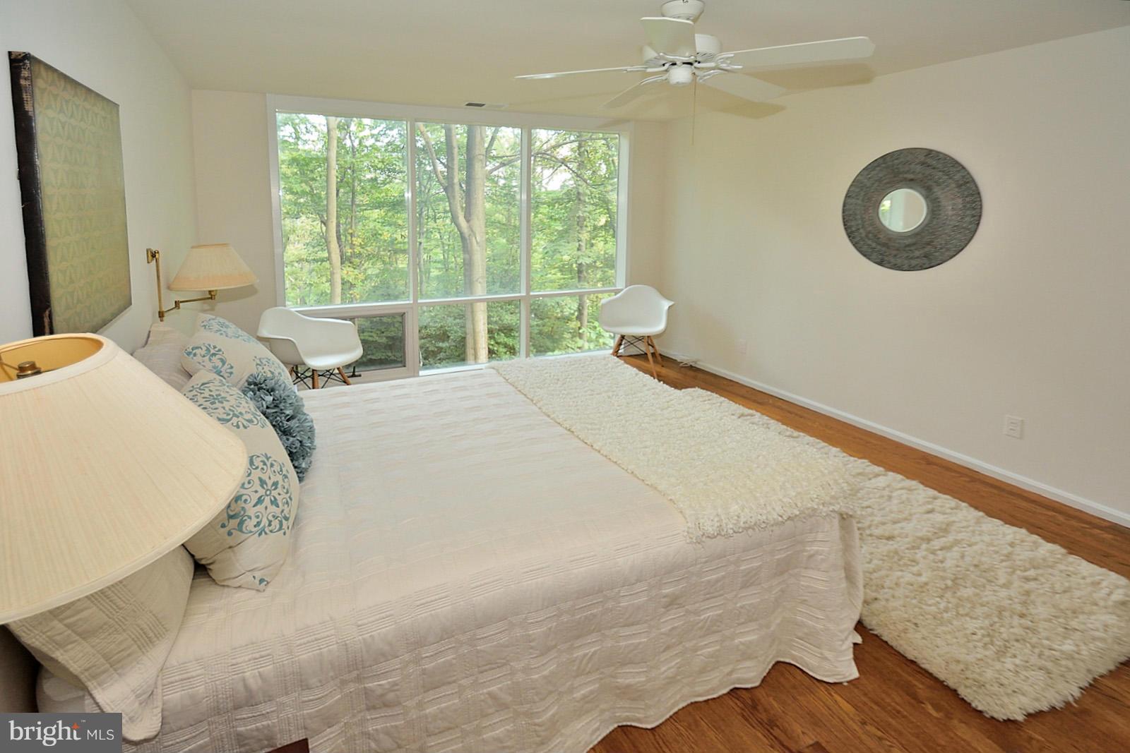 1925 Marthas Road Alexandria, VA 22307 - Photo 15 of 29 a bed sitting in a bedroom next to a window