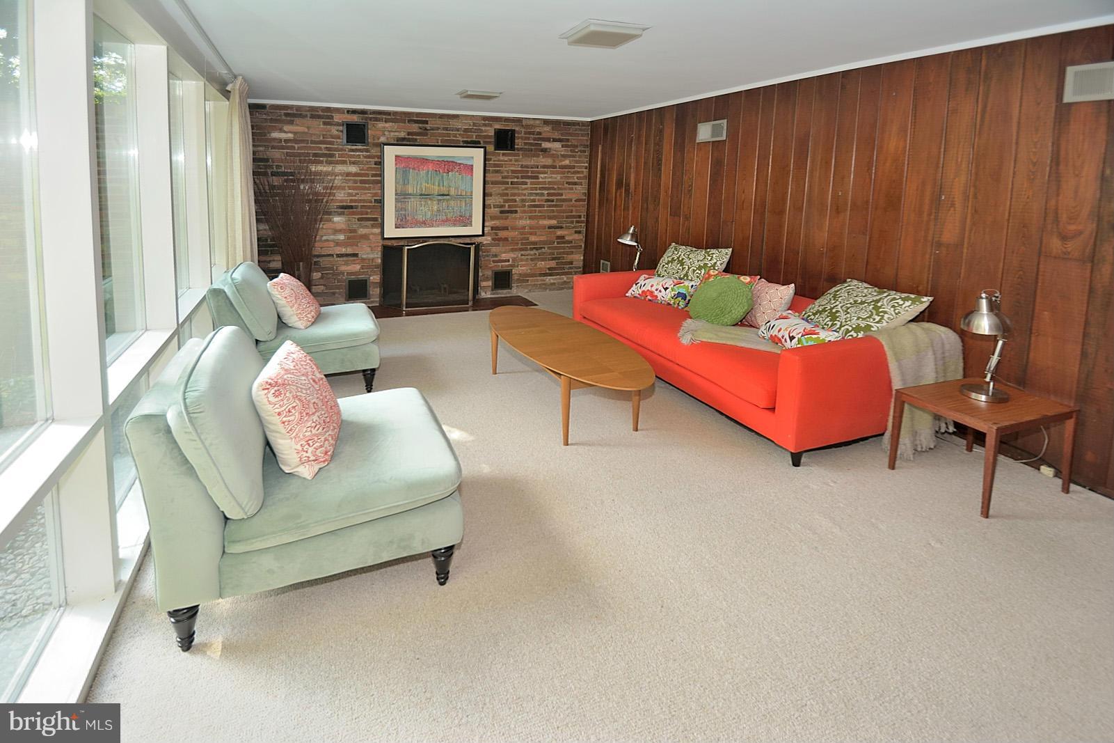 1925 Marthas Road Alexandria, VA 22307 - Photo 19 of 29 a living room with furniture and a fireplace