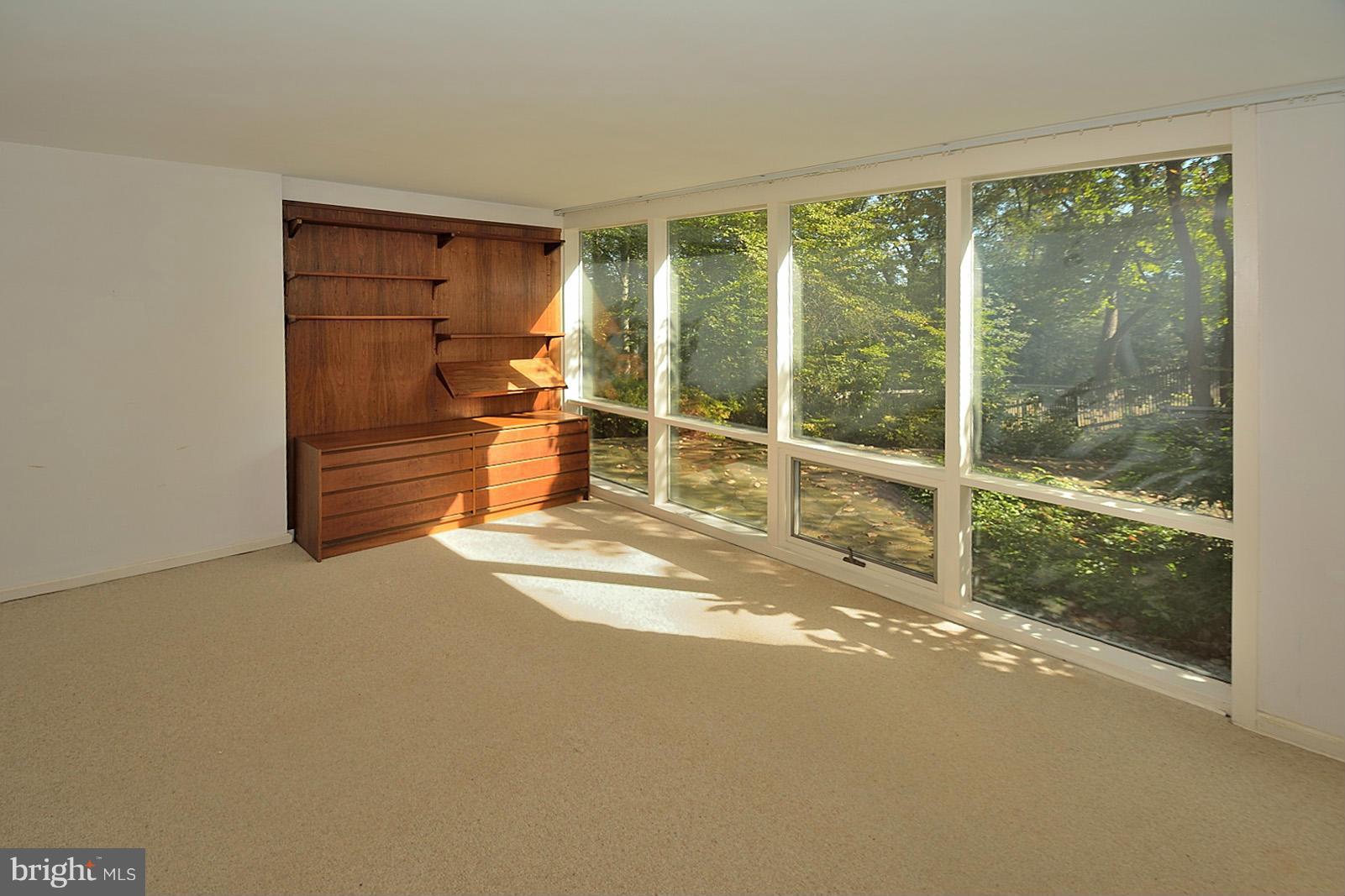 1925 Marthas Road Alexandria, VA 22307 - Photo 21 of 29 a view of a room with wooden floor and windows