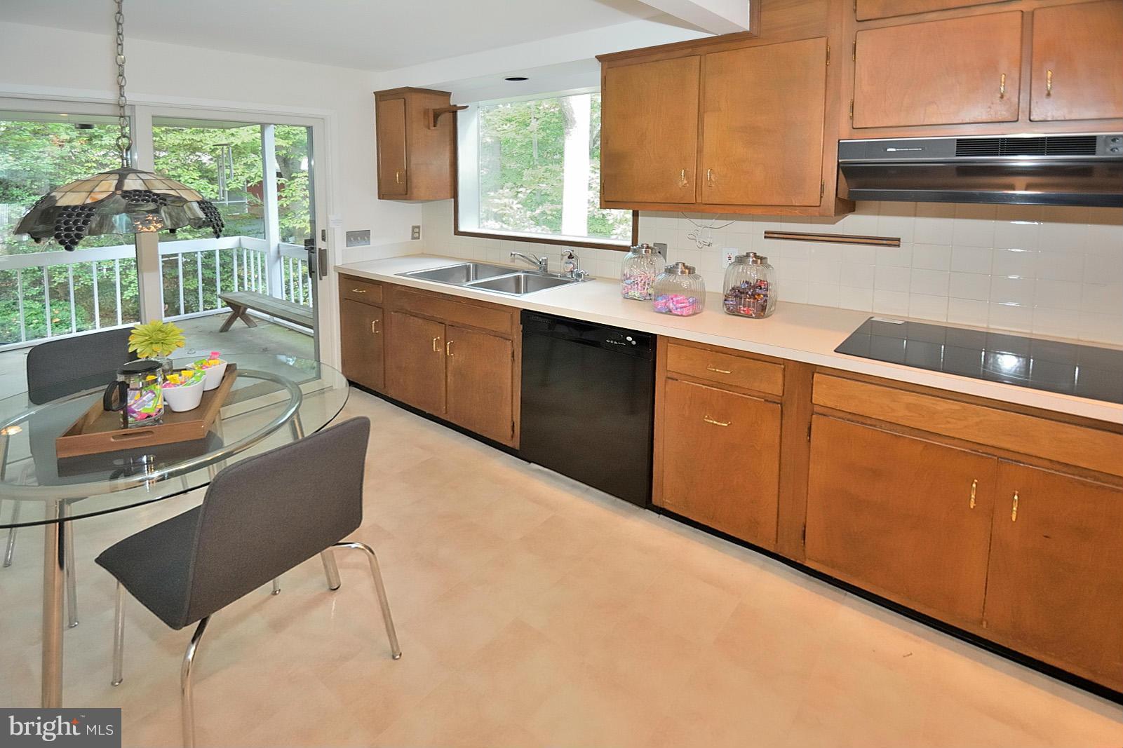 1925 Marthas Road Alexandria, VA 22307 - Photo 4 of 29 a kitchen with stainless steel appliances kitchen island granite countertop a sink dishwasher stove and cabinets