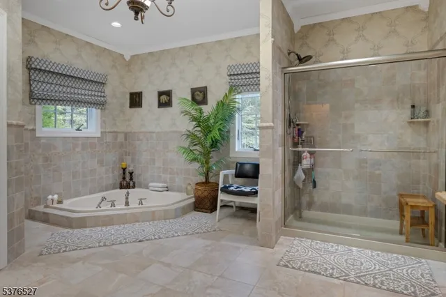 a bathroom with a tub and a sink
