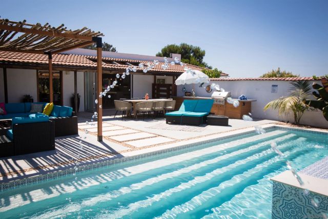 a view of a balcony with chairs