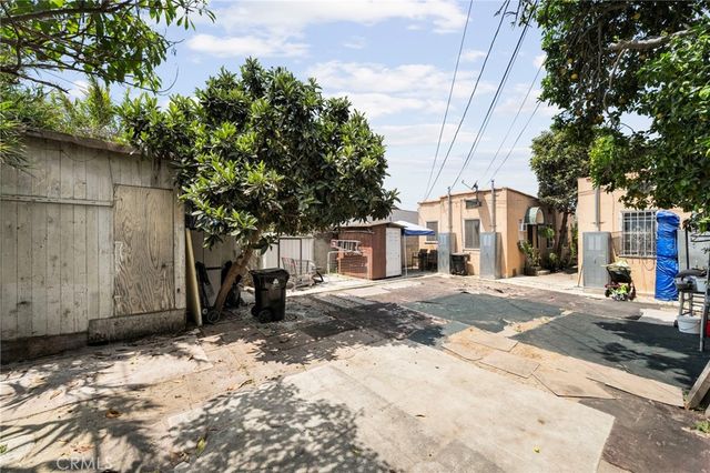 a view of a street with a building in the background