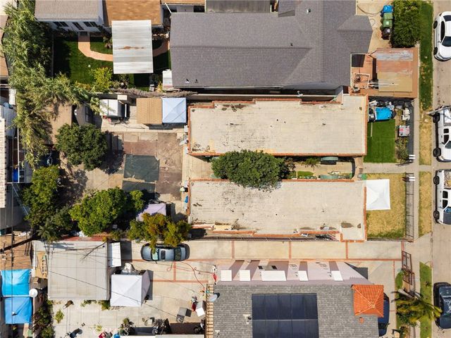 aerial view of residential houses with outdoor space