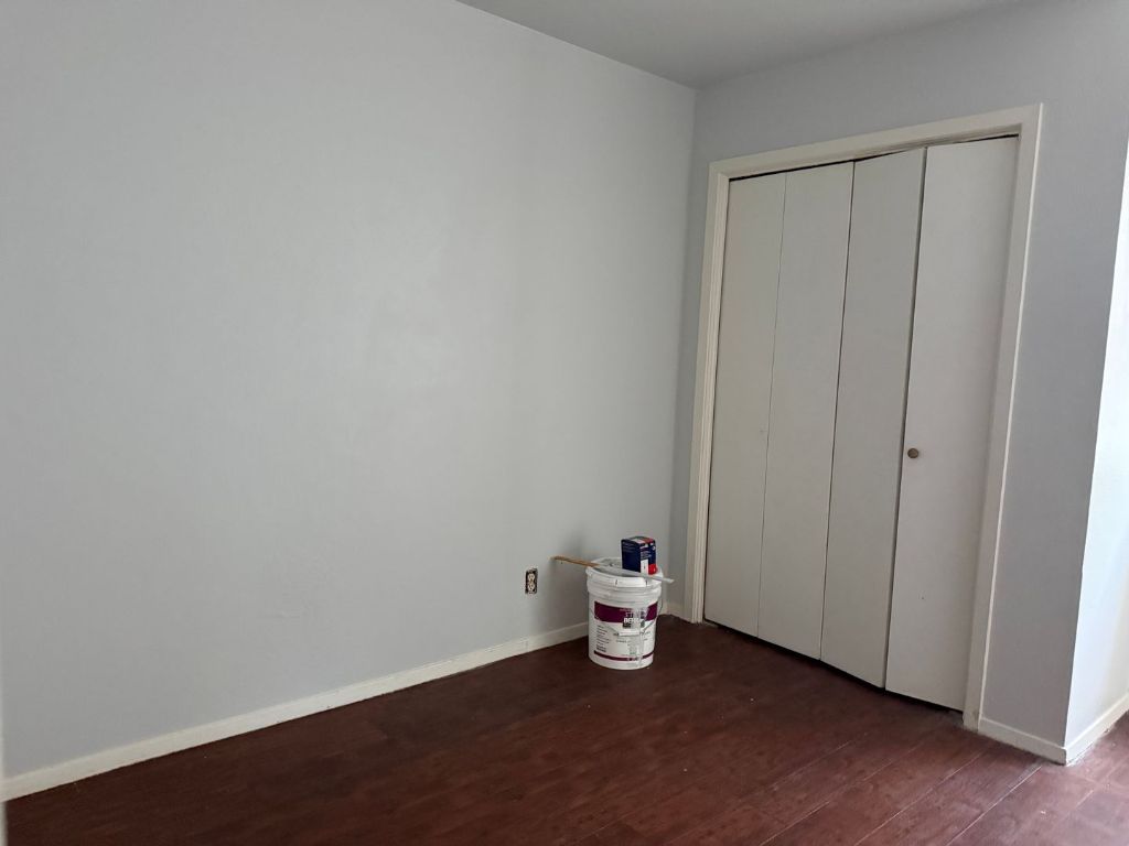 5506 Rose Hill Circle, Unit B Austin, TX 78745 - Photo 6 of 9 a view of a room with wooden floor