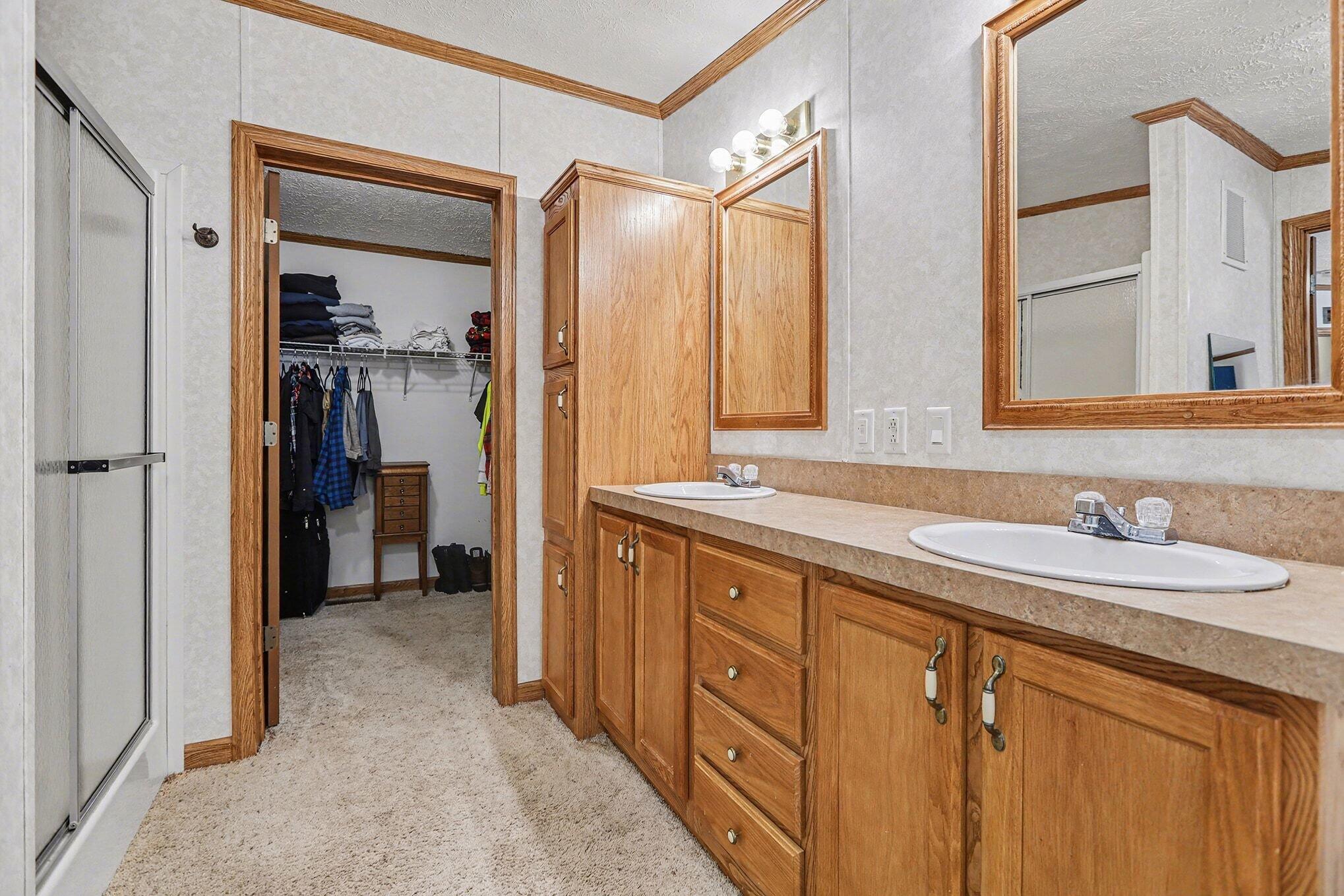 3104 Steinberg Road Manistee, MI 49660 - Photo 4 of 26 Primary bath and walk-in closet