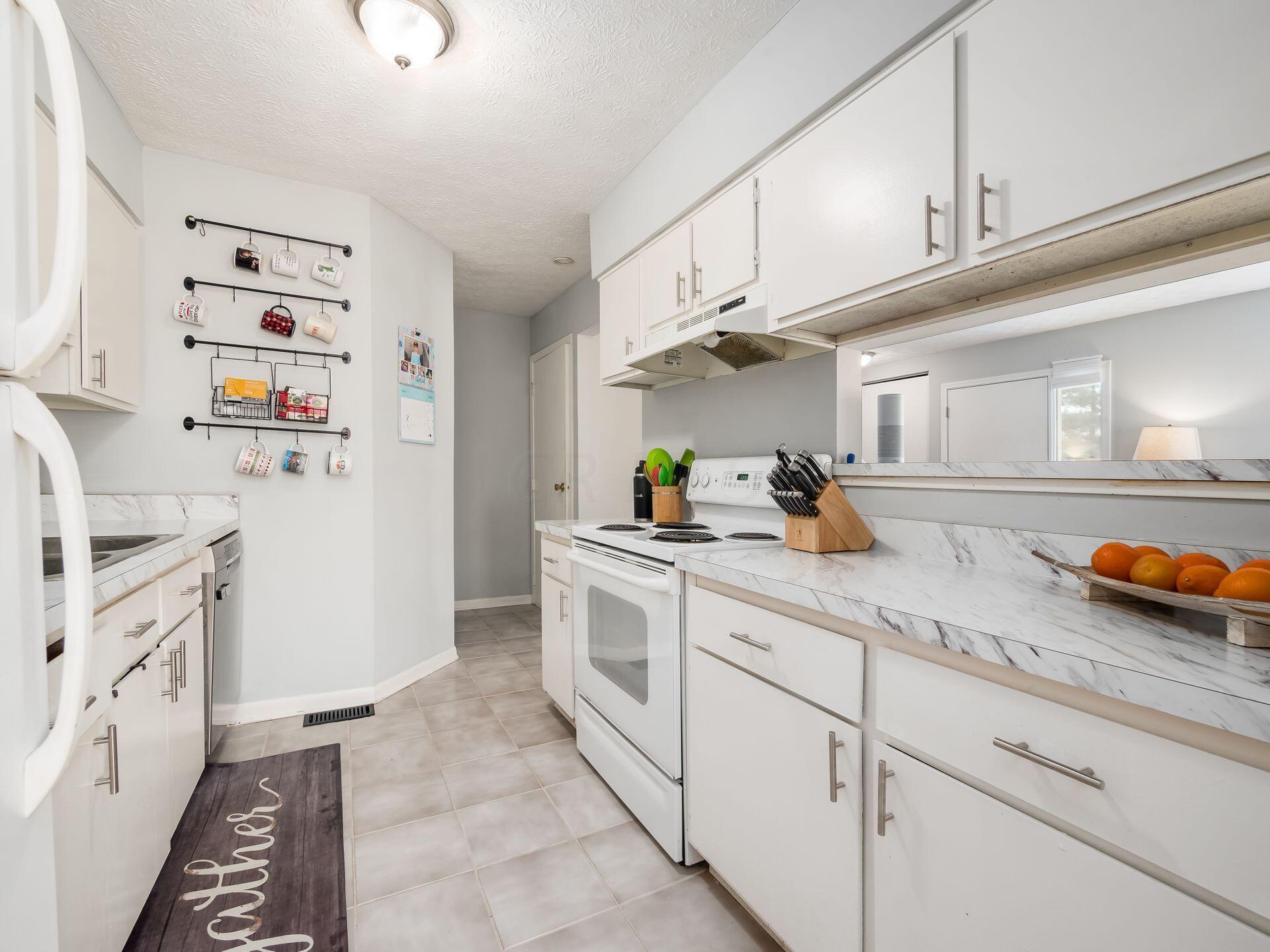 5218 Dierker Road, Unit B Columbus, OH 43220 - Photo 10 of 30 White Cabinets