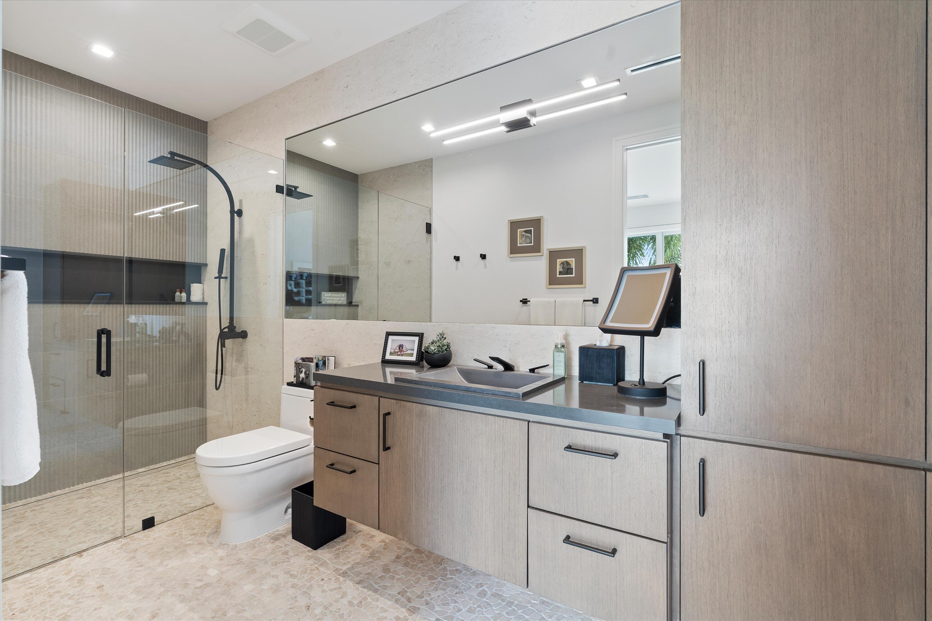 917 Bucida Road, Unit C Delray Beach, FL 33483 - Photo 23 of 77 Club level bathroom